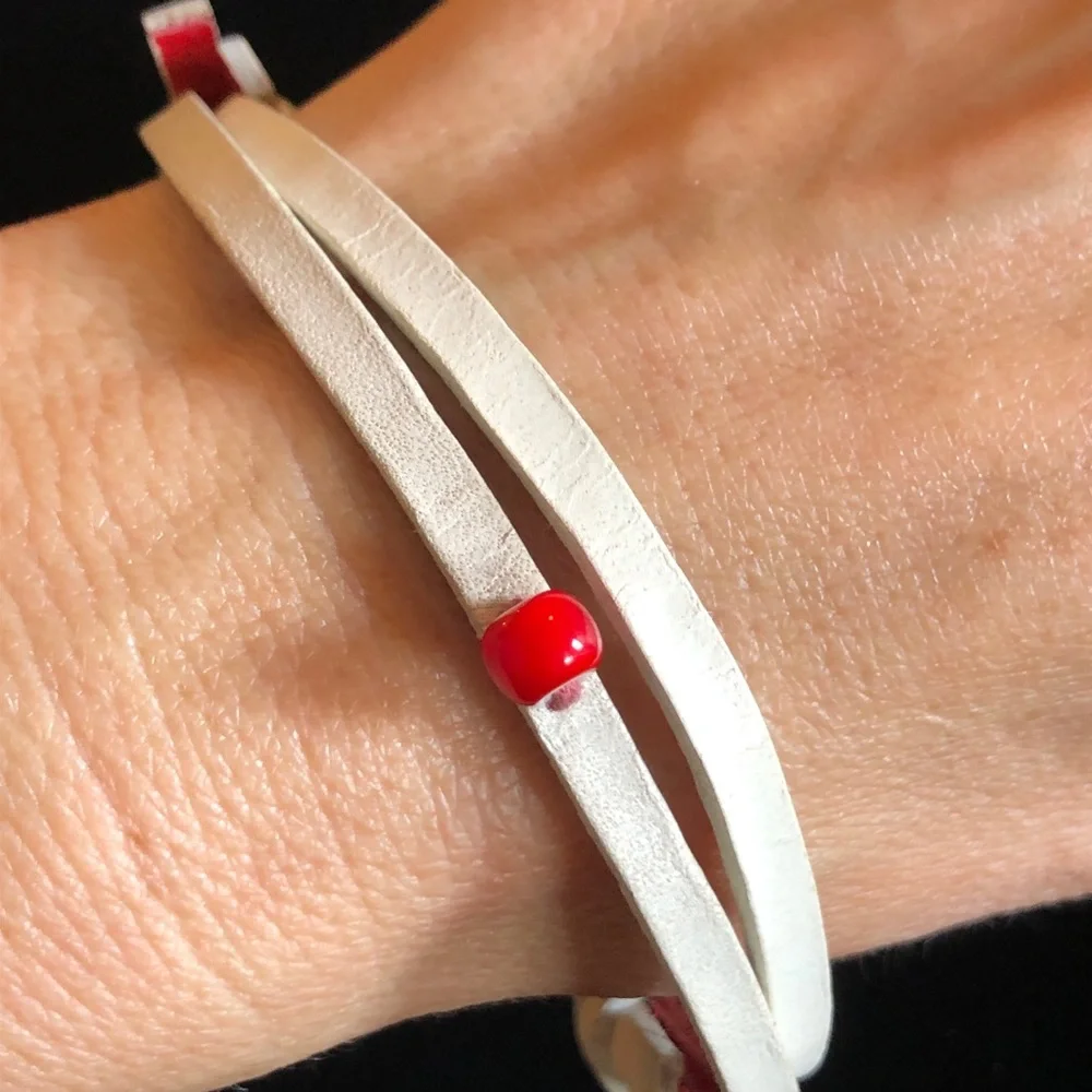 Elegant White Bracelet with Red Bead and Inspirational “Red” Quotes